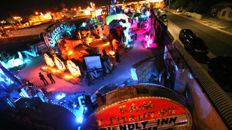 People walk through the Neon Museum at 770 Las Vegas Boulevard  during the Grand Lighting ceremony Tuesday, Oct. 23, 2012.The museum, which has more than 150 vintage neon signs, will open to the public  on Oct. 27. 
(Jeff Scheid/Las Vegas Review-Journal)